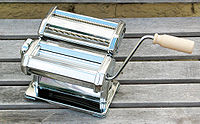 Pasta - Pasta is made from a simple combination of flour and water. Pre-packaged speciality pasta often includes spices, cheese or added coloring from spinach, tomatoes or food dye.  Under Italian law, dry pasta (pasta secca) can only be made from durum wheat flour or durum wheat semolina. Durum flour and durum semolina have a yellow tinge in color. Italian pasta is traditionally cooked al dente (Italian: 'to the tooth', meaning not too soft). Outside Italy, dry pasta is frequently made from other types of flour (such as wheat flour), but this yields a softer product which cannot be cooked al dente.  Particular varieties of pasta may also use other grains and milling methods to make the flour, as specified by law[4]. Some pasta varieties, such as Pizzoccheri, are made from buckwheat flour. Fresh pasta may include eggs (pasta all'uovo). Some specialty pasta varieties can be made from grains low in gluten for gluten-intolerant people, or from whole wheat flour. Gnocchi are often listed among pasta dishes, although they are quite different in ingredients (mainly milled potatoes) and therefore can't be called pasta because they don't contain flour.