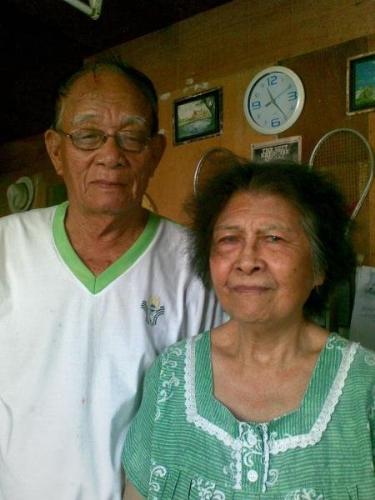 lolo and lola - this is my grandfather and grandmother...lola isn't so ready for this picture, thus the hair..ehehehe..