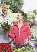 flowers - Man and girl shopping for flowers