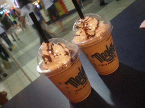 refreshments - A chocolate shake topped with an ice crean and even poured some chocolate syrup over it.