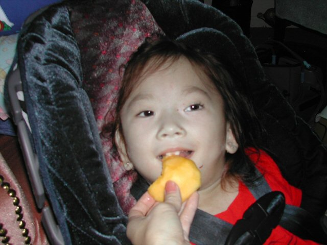 First peach! - My daughter's first time trying out the peach.  Didnt like it at first but she loved it.  Couldnt let her chew it because of her health condition but she wanted to lick more for the sweet peach.