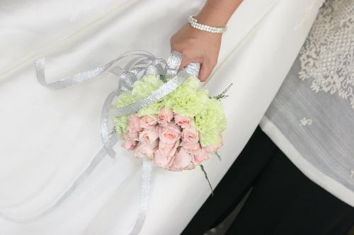 wedding bouquet - Wedding bouquet of green carnations and pink roses.