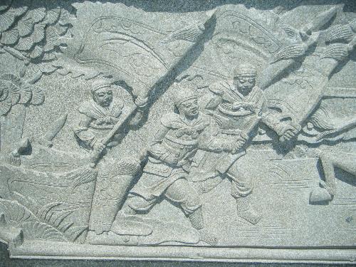 Stone carvings - Stone carvings on the wall of a Chinese Taoist Temple