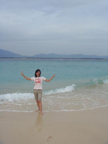 me -  this picture was taken in sanya,hainan province.i traveled there alone,a beautiful girl photoed it.