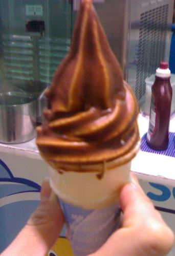 ice cream - I took this shot with my friend yesterday at the mall. Its from mr softy ice cream. Vanilla flavor with chocolate dip. Its cheap at price but its taste really delicious.