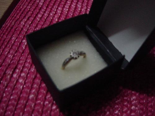 My engagement ring - This my simple engagement ring that my fiance give to me when he propose marriage to me. Its not really clear shot but that's my engagement ring. It is very simple and i love it.