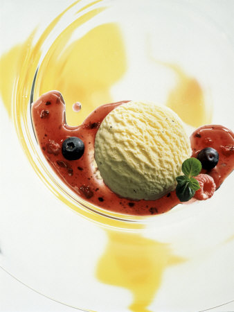 Ice cream  - This looks like a very exotic icecream layout presentation~ Delectable vanilla ice cream with cherry and strawberry sauce around it. garnished with chocolate sauce!