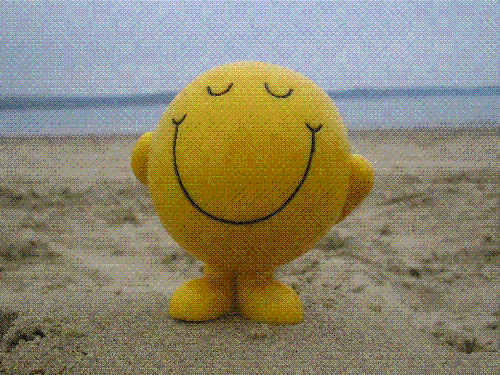Happy  - this looks like a stress ball,though its just a clay smiley. IT just shows how peaceful a smile can be . Near a shore it looks much more serene!