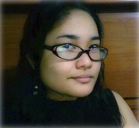 Lorie's Favorite Avatar - Taken one evening in the Commonwealth house where I stayed, against a wooden table. Edited to enhance the lighting.
