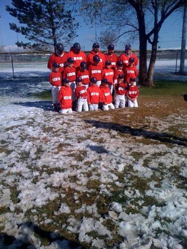 My eight year old son, Tyler's baseball team pictu - My eight year old son, Tyler's baseball team pictures in the snow today!