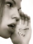 gossip - shows the personification of somebody who loves to gossip.