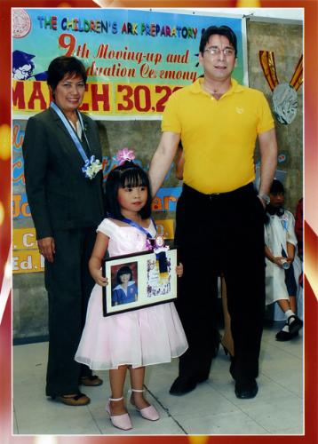 Recognition Day 2 - This was taken during our youngest daughter's graduation and recognition day last March 2009, where she received awards for being Top 3 of the kindergarten batch.