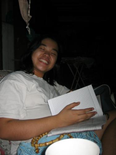 Joyce as high student - She happily does her assignments