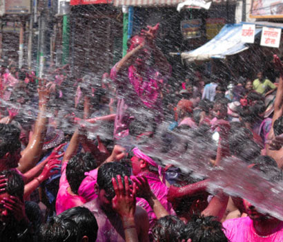 holi - This is a pic of people enjoy Holi.
We all play with water and colors in Holi.
