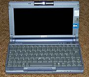 Laptop - A subnotebook, also called an ultraportable by some vendors, is a laptop designed and marketed with an emphasis on portability (small size, low weight and long battery life) that retains the performance of a standard notebook. Subnotebooks are usually smaller and lighter than standard laptops, weighing between 0.8 and 2 kg (2 to 5 pounds); the battery life can exceed 10 hours when a large battery or an additional battery pack is installed.  To achieve the size and weight reductions, ultraportables use high resolution 13' and smaller screens (down to 6.4'), have relatively few ports, employ expensive components designed for minimal size and best power efficiency, and utilize advanced materials and construction methods. Some subnotebooks achieve a further portability improvement by omitting an optical/removable media drive; in this case they may be paired with a docking station that contains the drive and optionally more ports or an additional battery.  The term 'subnotebook' is usually reserved to laptops that run general-purpose desktop operating systems such as Windows, Linux or Mac OS X, rather than specialized software such as Windows CE, Palm OS or Internet Tablet OS.