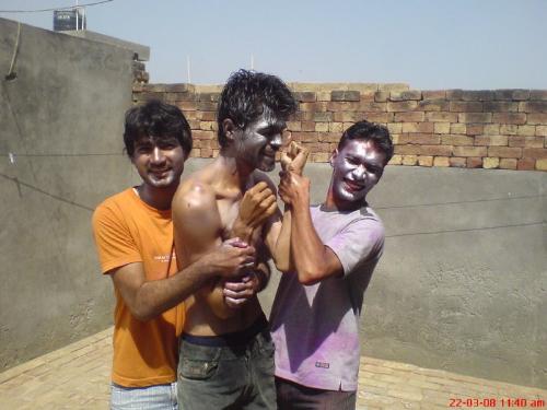 holi celebrations 2 - Me and one of my friend trying to color one of us.