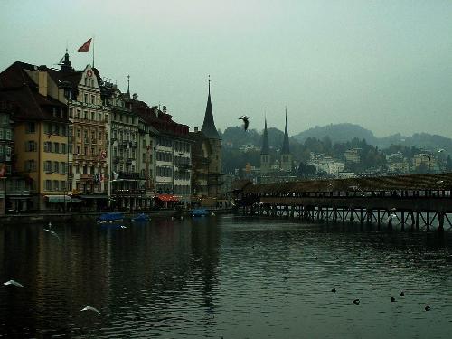 The Chapel Bridge of Luzern - The beautiful chapel bridge of Luzern, Switzerland taken last spring of 2004.  A tour to Switzerland always includes a visit to this beautiful city of Luzern.