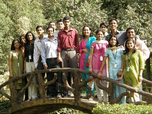 Friends! - This photo was taken in a suburban park in Mumbai,India. All of us from our office went their for lunch break. We were new joinees. It was like a trip everytime we all went out. Its one of the most memorable first trips together we took when we were with the same company. This beautiful park had a little bridge over the pond on which we ran and got ourselves clicked!