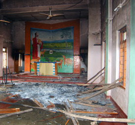 Attack on churches - This picture was taken in one of the churches of orissa......this place is know for regular violence on Christians......they just cant breathe......it has become a regular thing for political goons to come up and beat them up.......i think this picture says it all......this is one just picture.......there are more such disturbing pics of vandalized churches......