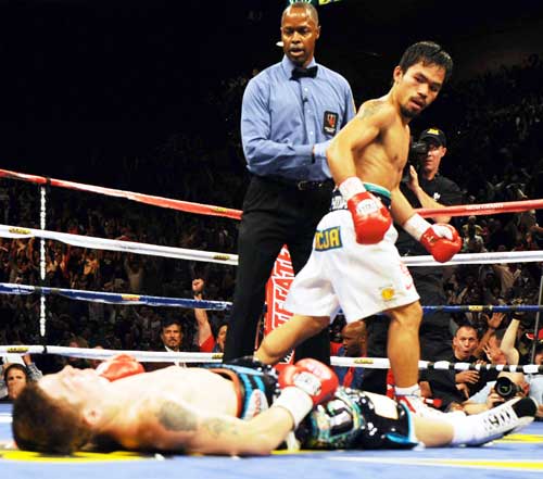 Paquiao Vs Hatton - May 2, 2009 at the MGM Grand Las Vegas Nevada. 9 Seconds before the 2nd Round, Ricky 'the Hitman' Hatton laid flat on his back for several minutes after a thunderous blow to the jaw by Manny 'Pacman' Paquiao.