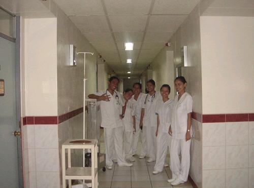 nurses in the hallway - these are nurses seen in the hospital hallway after their rounds.
