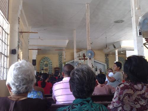 religion - people praying at the church