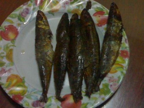 fried smoked fish - In Philippines it is called 'tinapa'. It's a smokes fish but you have to fry it before you can eat it.