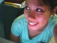 This is me! - I had this picture taken in the computer shop of my mom's friend and I was trying to find my right angle. Hopefully, this is the best angle, Hmm, maybe the best angle so far.