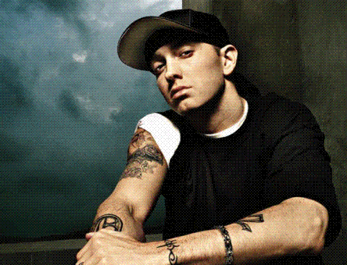eminem - eminem showing tattooed arm