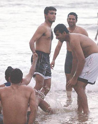 indian cricket team - indian cricket team players in the beach enjoying