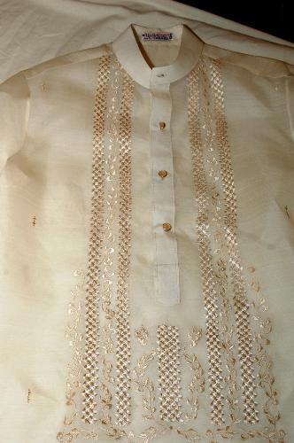 Groom's wardrobe - This is called Barong Tagalog. This is usually worn by the groom here in our country the Philippines.