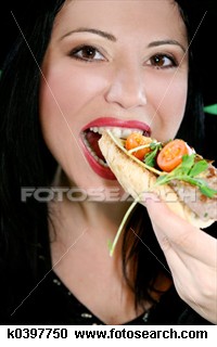 a woman eating. - we can see into the picture that a woman eating. so ymmuy!