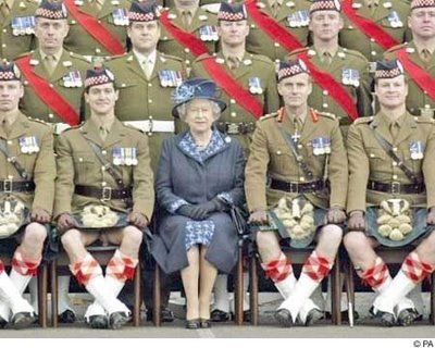 Kilted Scotsmen - Queen seems happy with the man next to her