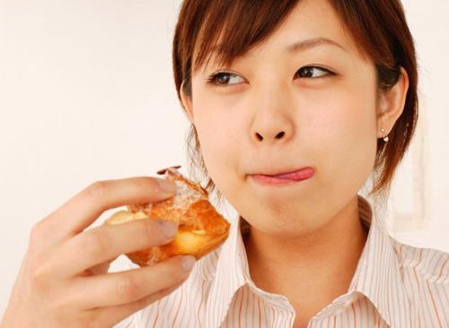 eating - asian woman enjoying eating