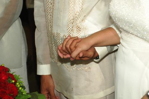 Wedding vows - Saying I do of the couple. A promise to stay forever.