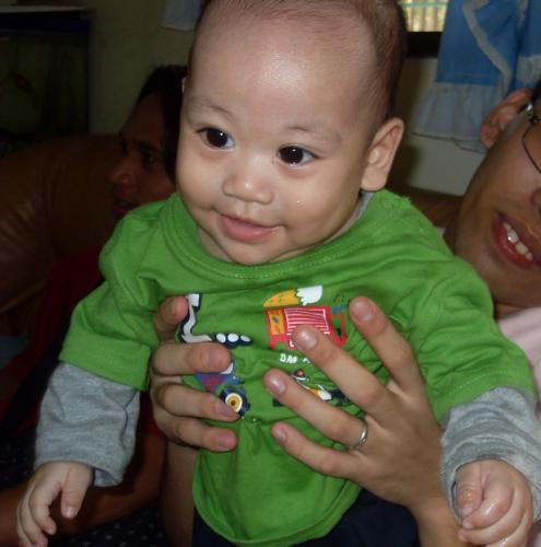 my baby  - this was taken at my sister's house   christening of my nephew rafael
