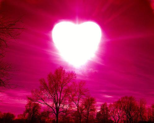 A morning of love - This picture is showing a morning of love because instead of sun a heart is raising in the sky and enlightening the world with its light. 