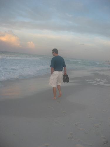 my husband on the beach - walking on the beach at sunrise