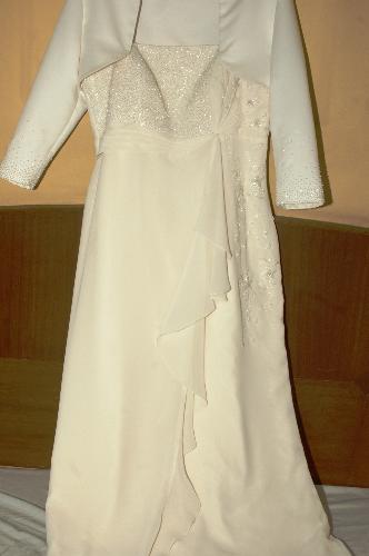 my wedding dress - It doesnt cost much because I will only use it once. But I never regretted wearing it because I only wear it once and not a lifetime