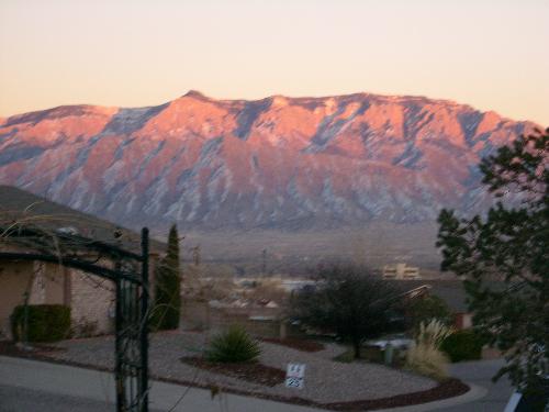 Sun setting in New Mexico - This is a picture of the sun setting over the Sandia Mountains in New Mexico