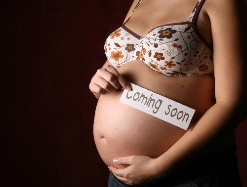 Pregnant lady with big belly - Baby Gender STILL Unknown