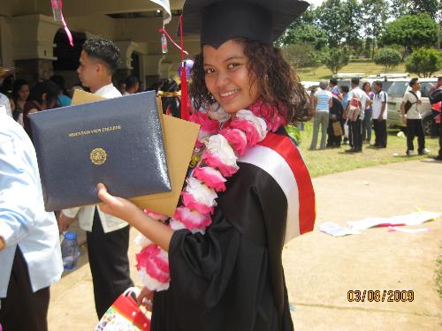 College Graduation - College graduation! Oh, what a bliss it is to have accomplished a bachelor's degree! I'm proudly showing off my diploma here... I love the feeling of having accomplished something! Hats off and cheers to all college graduates!! =)