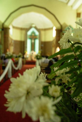 the altar - The church was decoarted with white green motif.