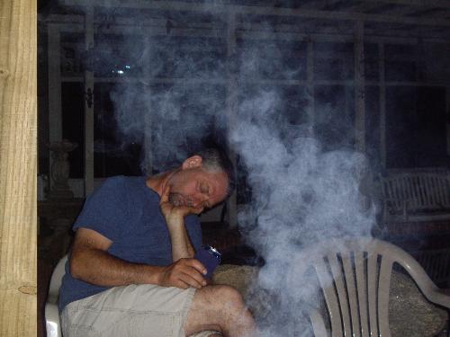 Funny  - This is a pic of my uncle passing out at the camp fire, we had a long day of golfing so we were all a little wipped and plus the heat took a toll on us all, he lives in Arizona with his wife and kids.