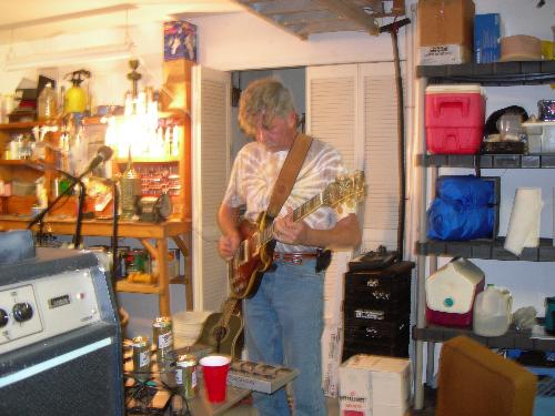 Me - Playing guitar with my cousin, Bob, in Ft. Meyers FL.