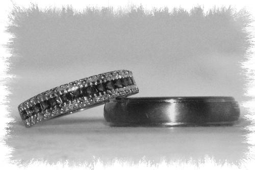 Our wedding bands - These are a picture of mine and Jake&#039;s wedding bands from a photo shoot I did. This was the picture that went on our wedding invitations.