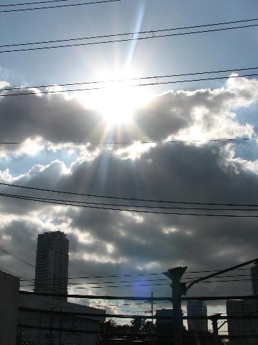 Sunrays over the Clouds - I took this shot while walking around an overpass road going to a mall in our place.