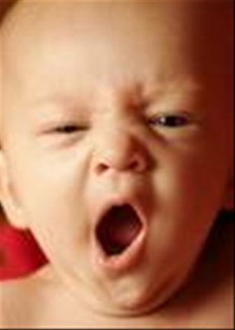 A child yawnning - THIS is a cute picture of a child yawning.the child is about the some months old and the yawnig it quite funny.