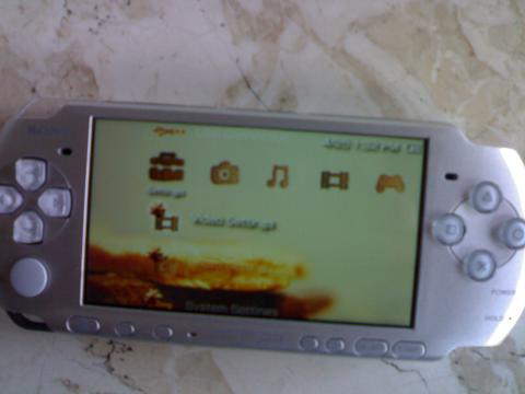 psp3 - This is my nephew's psp from canada. Given by her grandma. Its slim and gray in color.