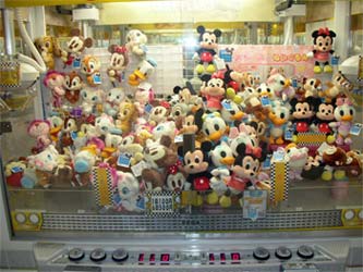Toy Catcher Machines - Toy Catcher Machines with Disney plush toys.